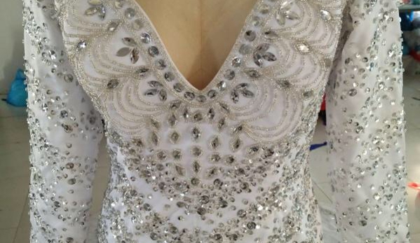 Midsouth Wedding Gown Sales & Rentals - Collierville, TN. Custom designed and hand beaded