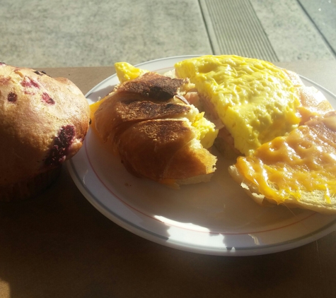 La Bou Bakery & Cafe - Rocklin, CA. Ham egg cheese on croissant with raspberry muffin