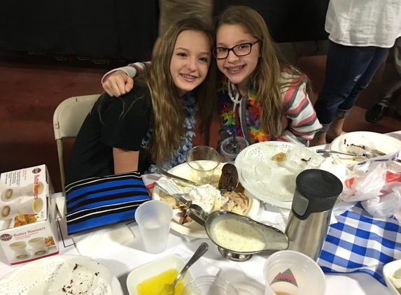 Eich Middle School - Roseville, CA. Crab Feed volunteers taking a break!