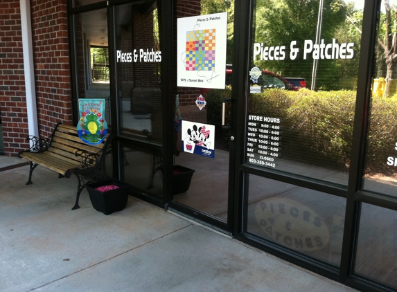 Pieces & Patches - Lexington, SC. On behind McAlister'sDeli. Just follow the road to back. Plenty of curbside parking.