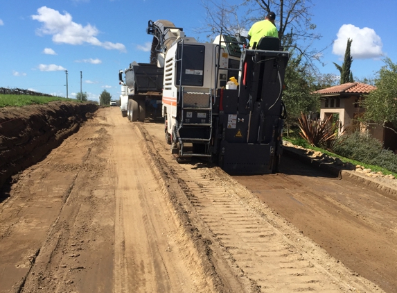 Summit Paving Contractors - Lodi, CA. Dirt work and excavating roadway.