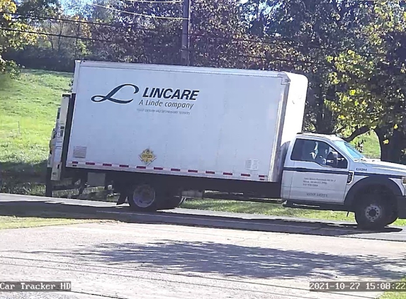 Lincare - Cincinnati, OH. LinCare truck on NO TRUCK rural road.