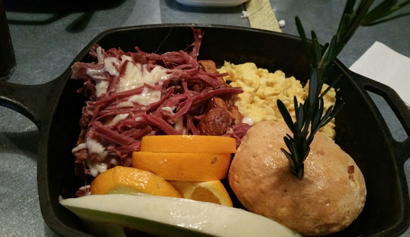 Hash House A Go Go - Orlando, FL. The corned beef hash and eggs. Beautiful presentation tasted awful!