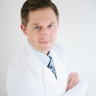 Austin Mitchell, MD