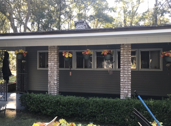 Mr.C's Home Improvement LLC - Kingsland, GA. Trim painted white siding install also aluminum around windows