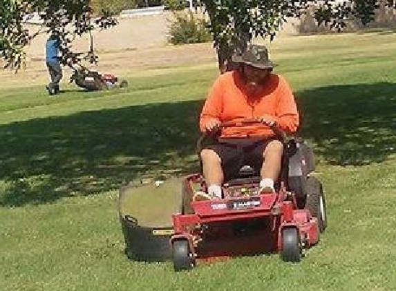 JGS Irrigation & Landscape Services - Lancaster, CA. Using a large riding mower for the larger area