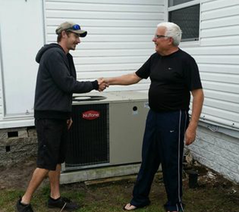 National Heating & Air Conditioning Inc. - Clearwater, FL. You wanna wrestle? This guy is the best thank you for the great install.