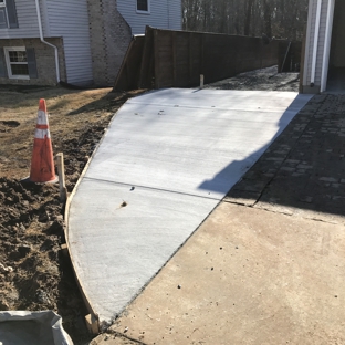 American Veteran General Contractors - Ellicott City, MD. Concrete driveway and gravel RV lot