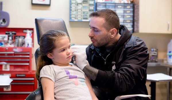 Dv8 Tattoo Body Piercing - Roseville, CA. Marshall repping her ears