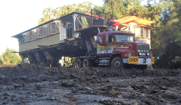 Queensland House Removers - Caboolture, QLD. House joined, getting into position to stump
