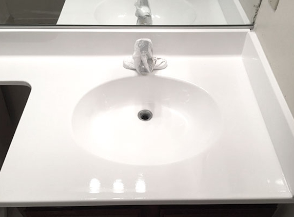 Bathtub Refinishing And Fiberglass Expert - Los Angeles, CA. Bathroom sink and counter top marble immitation reglazed in white color.