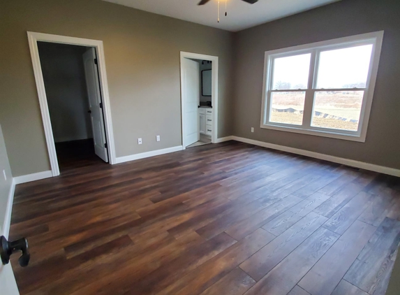 Hazelwood Homes. Master bedroom with LVT flooring throughout. LVT is in 99% of the homes we build. It's popular because of the price point, quality, low main