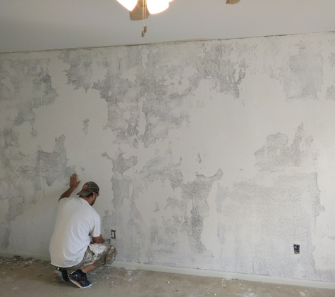 D & D Brothers Construction - Pasadena, TX. Skimming the Ugly Wall to re texture and paint.