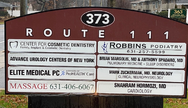 The Center for Cosmetic Dentistry - Smithtown, NY. Signboard outside the office of The Center for Cosmetic Dentistry Smithtown NY