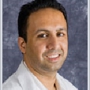 Dr. Adil Mohamed Roomi, MD