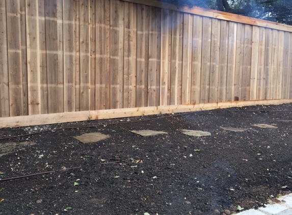 Lone Star Turf and Landscape LLC - San Antonio, TX. 250 Foot Board on Board Cedar Fence and retaining wall