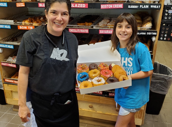 The Donut Shop - Bloomingdale, GA. Rebecca and Bill Lewis of Vero Beach, Florida, making a donut run at The Donut Shop Bloomingdale in Bloomingdale, Georgia.