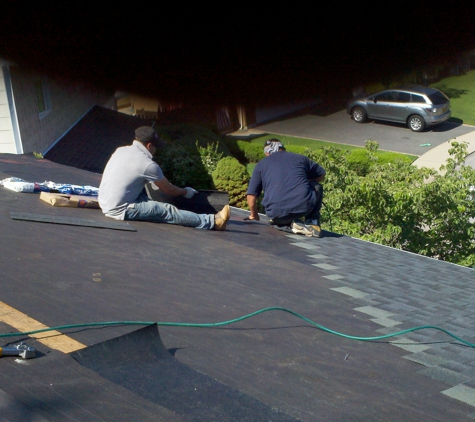 All American Home Improvement - Farmingdale, NY. Installation of roofing shingles