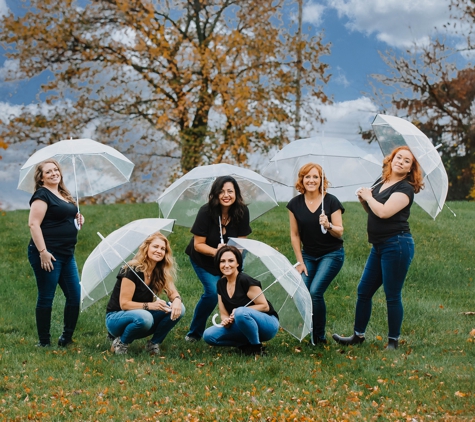 Alrez Family Dentistry - Glen Mills, PA. Alrez with umbrellas