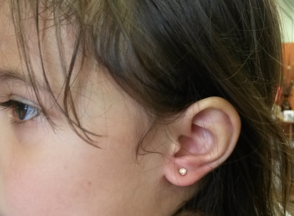 Zaraz Collection - Lynbrook, NY. Julissa from Franklin Square - ear piercing without tears .. left laughing