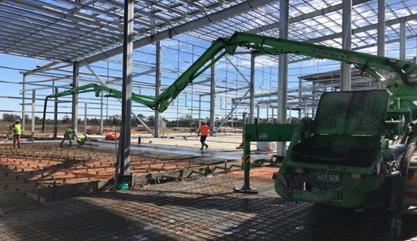 George's Concrete Pumping Services Pty Ltd. Our pump can extend from one side of the construction to the other