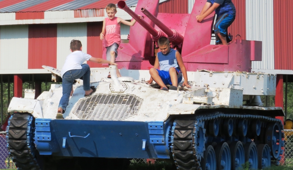 Greenwood Acres Campground - Jackson, MI. Both kids and adults enjoy  exploring the old Military Tank.