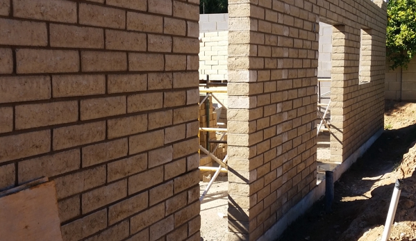 Building Block Masonry - Phoenix, AZ. Brown 8x4x16 slump block addition