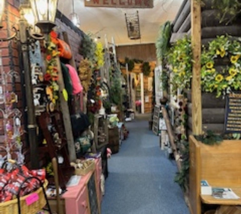 Posie Patch Florist & Gifts - Prudenville, MI. 5 room gift village