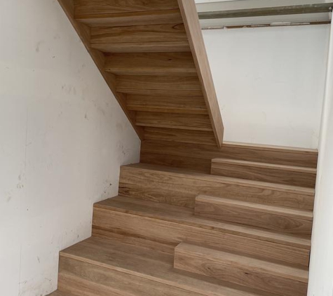 MJ Carpentry and Joinery - Westmead, NSW. Beautiful Solid 3/4 tonne Black Butt stair case. Looks exactly like the photo it was copied from. $15000