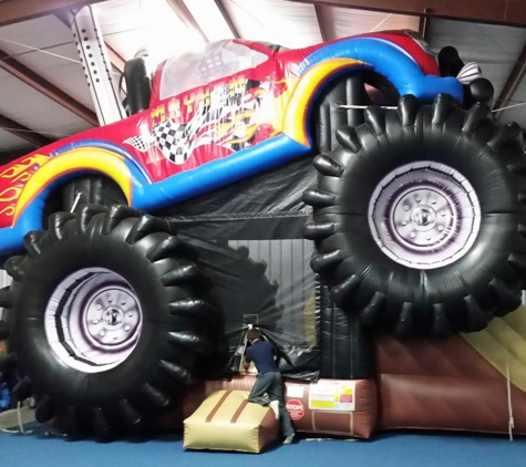 Big Kahuna Indoor Theme Parties - Tyler, TX. Monster Truck is a combo bounce and slide.