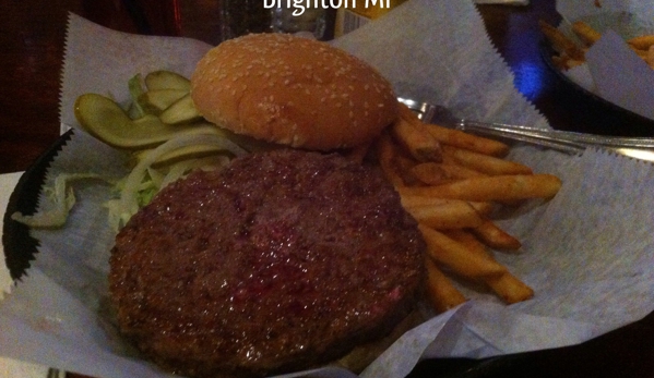 Stout Irish Pub - Brighton, MI. This half pound ground sirloin burger is the Wednesday Special $3.99 all day. They are very juicy and tasty