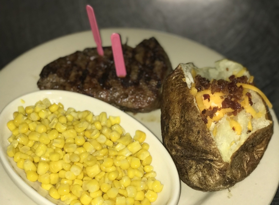 Logan's Roadhouse - Ruston, LA. 8 oz sirloin steak with steamed corn and loaded baked potato