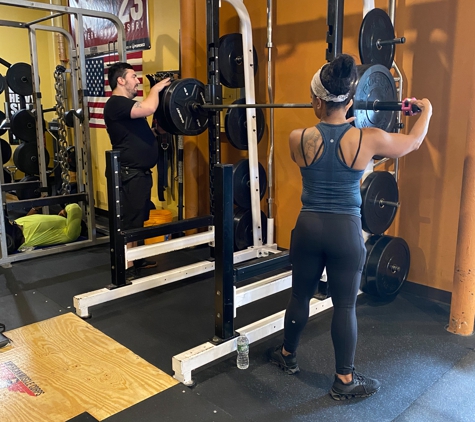American Muscle Corps - Pawtucket, RI. Coach Gail training a client at AMC 545 Pawtucket Ave. Unit #115 Pawtucket, RI 02860.
