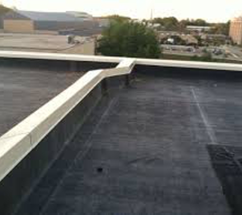 Commercial Industrial Roofing,LLC - Youngstown, OH. Epdm with 24 gauge prefinished white metal coping cap