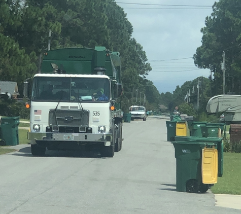 Waste Pro USA Inc - Milton, FL. Can’t drive down the street. WP leaves cans in street. Half-ass