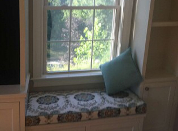 Custom Woodworking Co - Norfolk, MA. Window seats have easy close drawers with tons of storage!