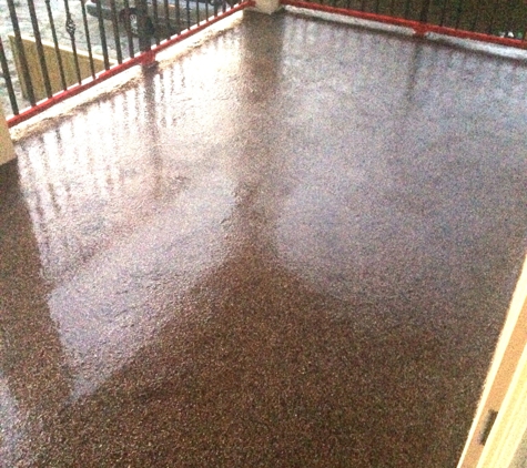 Decorative Concrete Designer. Metallic flakes with epoxy and urethane VA top coats.