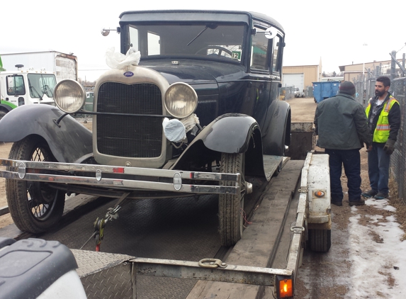 Father & Son  Towing - Littleton, CO. 1929 model A Ford hauled for good Customer