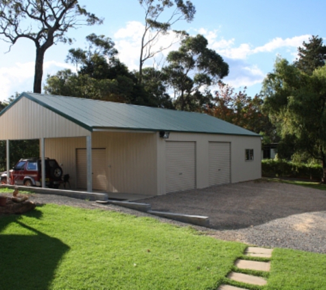 Judds Garages - Edgeworth, NSW. Custom Built Triple Garage With Garaport