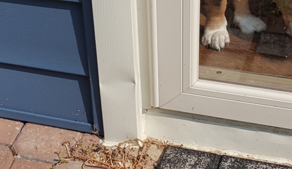 Ascott Home Services - Canton, MI. Trim around front door dented