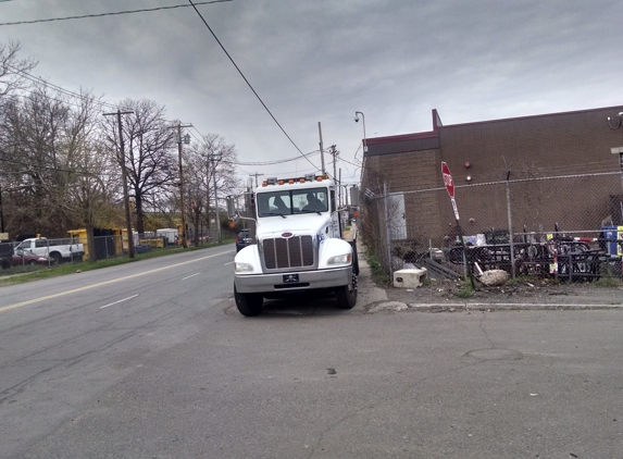 Elm City Auto Wrecking - New Haven, CT. Dangerous illegal sidewalk parking