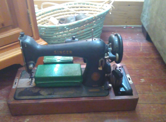 The Corner Door Antiques - Savannah, GA. 1950 singer sewing machine in working condition.with all the original parts and papers.if interested contact me at jeremygauthier14@gmailcom