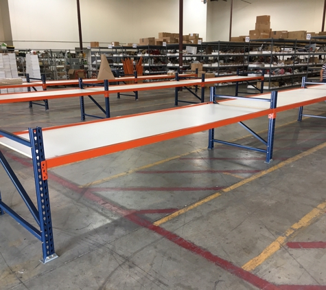 Warehouse Cubed Consulting Group - Prosper, TX. Warehouse style Worktables
-Uprights Range from 42'' to 48" Deep
-Upright Heights from 30ft to 36ft 
-Beams from 96'' to 144'' long​