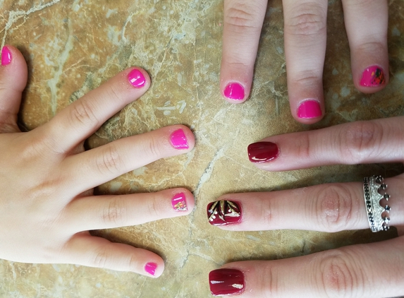 Smile Nails & Spa - Lebanon, TN. Me and my middle daughter's nails last weekend for her birthday planning on taking her this weekend for pedicures!