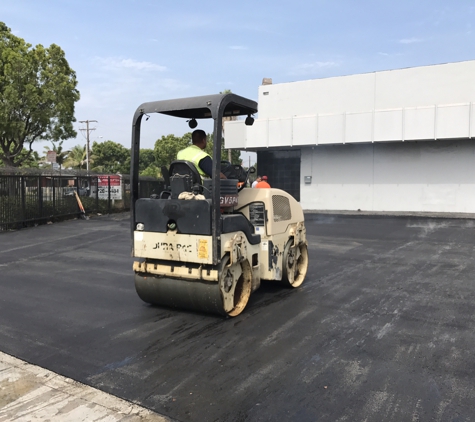 Elias Asphalt Engineering Co. - Los Angeles, CA. Look at that new fresh asphalt! Call us today to change the look of your property in two days flat!