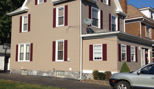 Shell Restoration - New Castle, PA. Brand new siding and shutters
