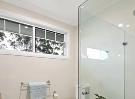 Bradnam's Windows & Doors - Bungalow, QLD. Frameless Shower Screen - Corner Configuration