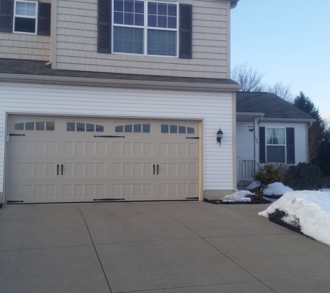 Davis Door Company - Norton, OH. 16x7 Amarr carriage house garage door installed by Davis Door Company www.Davisdoorcompany.com