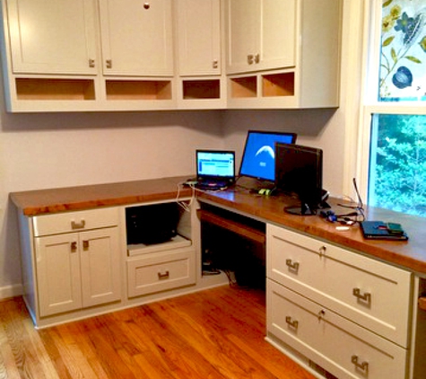 Woodmaster Woodworks - Wake Forest, NC. Pain grade corner desk with wood countertop and printer pullout.
