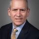 Fred A. Lado, MD, PhD